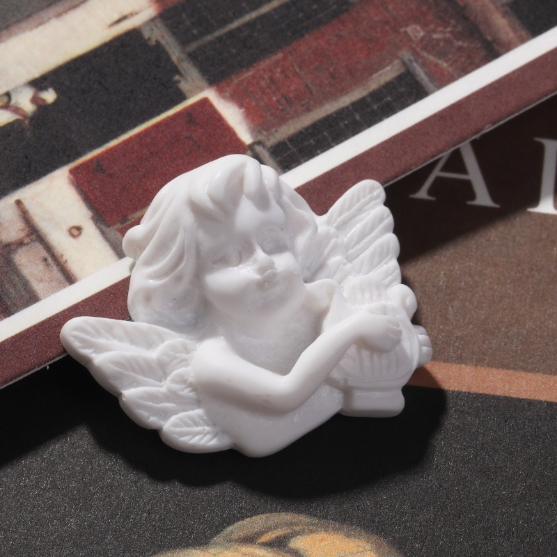 20mm baroque style white cherub snap button