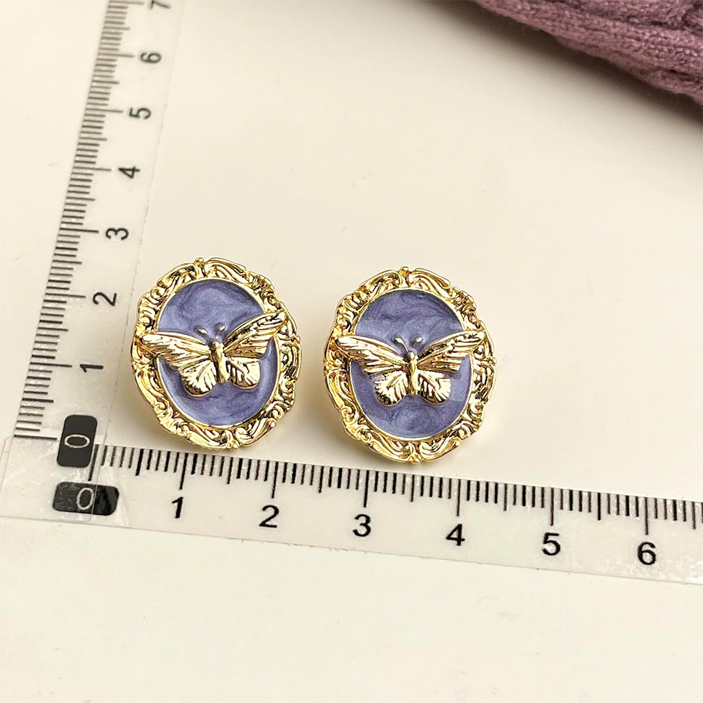 French retro purple oil drop earrings for women with super fairy temperament and sweet flower earrings with silver needles