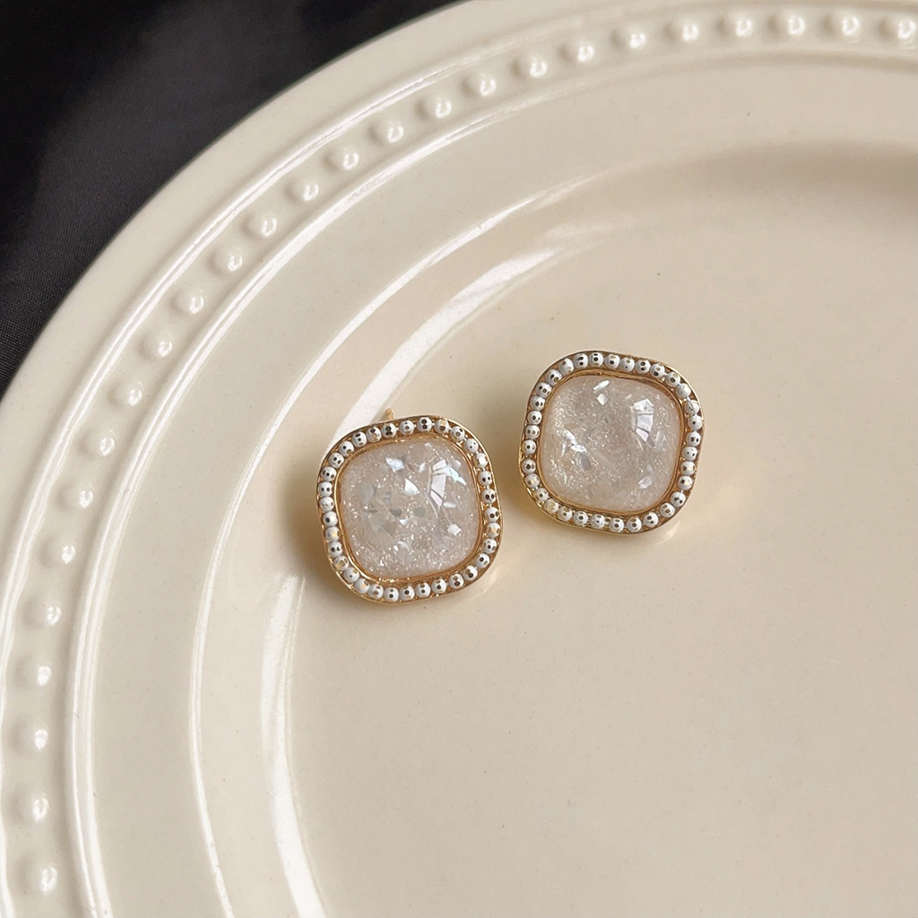 Vintage style crushed shell earrings with silver needles
